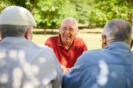 simsearch:400-06142278,k - Active retired senior people, old friends and leisure, group of three elderly men having fun, laughing and talking in city park. Waist up Stock Photo - Budget Royalty-Free & Subscription, Code: 400-06685919