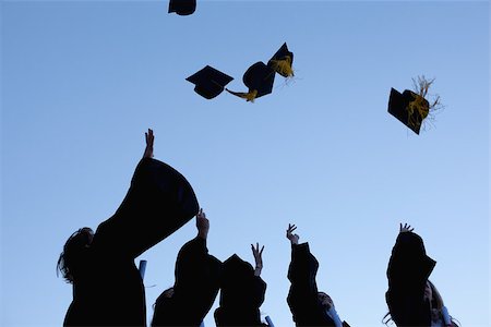 simsearch:400-06688304,k - Low angle-shot of five graduates throwing their hats in the sky Photographie de stock - Aubaine LD & Abonnement, Code: 400-06688302