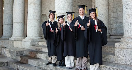 simsearch:400-06688304,k - Five happy graduates posing the thumb-up in front of the university Photographie de stock - Aubaine LD & Abonnement, Code: 400-06688408