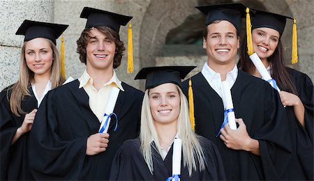 simsearch:400-06688304,k - Close-up of five happy graduates posing in front of the university Photographie de stock - Aubaine LD & Abonnement, Code: 400-06688416