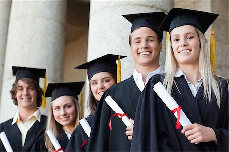 simsearch:400-06688304,k - Close-up of five smiling graduates posing in front of the university Photographie de stock - Aubaine LD & Abonnement, Code: 400-06688412