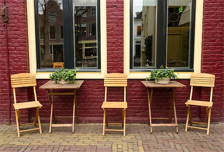europe sidewalk cafe - small outdoor cafe in the Netherlands Photographie de stock - Aubaine LD & Abonnement, Code: 400-06697595