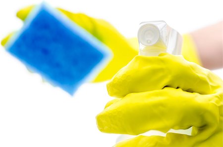 simsearch:400-08693600,k - Hand in a rubber glove holding a detergent spray and a sponge. Stock Photo - Budget Royalty-Free & Subscription, Code: 400-06698395