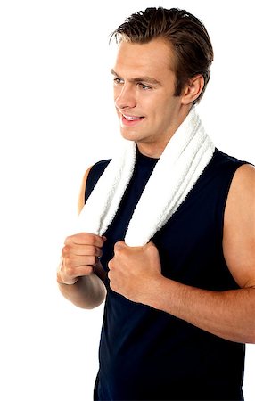 simsearch:400-06482604,k - Handsome man posing with towel around neck isolated over white Stock Photo - Budget Royalty-Free & Subscription, Code: 400-06699833