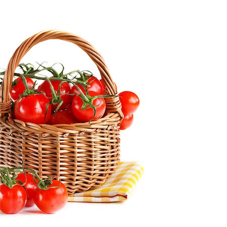 simsearch:400-04393672,k - Ripe tomatoes in a basket on a white background. Stock Photo - Budget Royalty-Free & Subscription, Code: 400-06699988