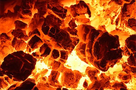 Burning coal. Close up of red hot coals glowed in the stove. Photographie de stock - Aubaine LD & Abonnement, Code: 400-06693287