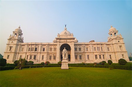 Landmark building of Calcutta or Kolkata, Victoria Memorial Hall with Queen's Garden in the front, white Marble and blue sky Stock Photo - Budget Royalty-Free & Subscription, Code: 400-06693306