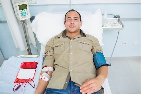 patient injection arm not children - Smiling transfused patient in hospital ward Stock Photo - Budget Royalty-Free & Subscription, Code: 400-06734594