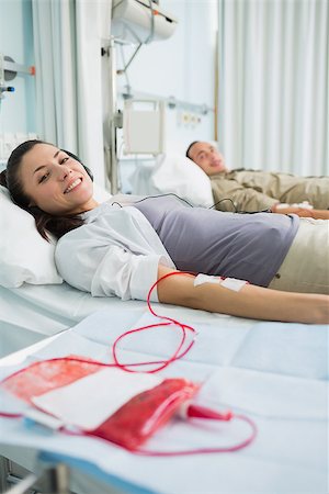 patient injection arm not children - Patients looking at camera in hospital ward Stock Photo - Budget Royalty-Free & Subscription, Code: 400-06734882