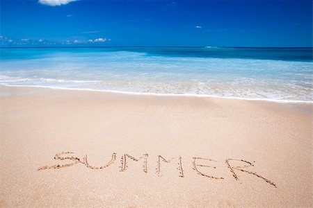 summer text message - Beautiful tropical beach with the word summer written on the sand Foto de stock - Super Valor sin royalties y Suscripción, Código: 400-06739939