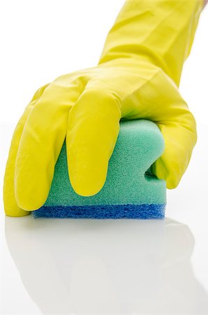 simsearch:400-08693600,k - Hand in a rubber glove cleaning a white surface with a sponge. Stock Photo - Budget Royalty-Free & Subscription, Code: 400-06744118