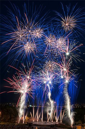 simsearch:400-06745167,k - Colorful fireworks over dark sky, displayed during a celebration Stock Photo - Budget Royalty-Free & Subscription, Code: 400-06745160