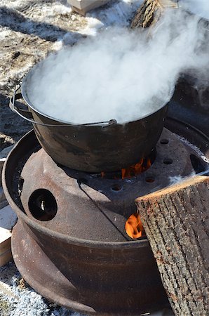 sap - The process of boiling maple sap to create maple syrup,  using a traditional method. Stock Photo - Budget Royalty-Free & Subscription, Code: 400-06745773