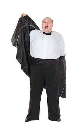 funny tuxedos - Very overweight elegant fat man yawning after a night out as he strips off his dinner jacket, studio portrait on white Stock Photo - Budget Royalty-Free & Subscription, Code: 400-06748591