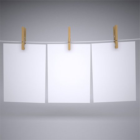 peg - Paper on a rope with clothespins. Isolated render on a gray background Stock Photo - Budget Royalty-Free & Subscription, Code: 400-06749373