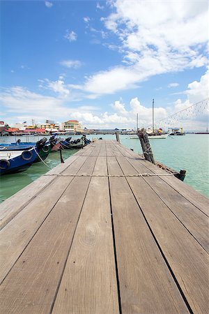 Boat Dock on Chew Jetty in Penang Malaysia with Blue Sky Stock Photo - Budget Royalty-Free & Subscription, Code: 400-06740680