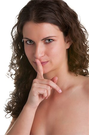simsearch:400-04175955,k - Closeup of a woman with her finger over her mouth Stock Photo - Budget Royalty-Free & Subscription, Code: 400-06743852
