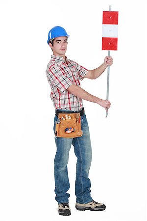 Worker holding up road sign Stock Photo - Budget Royalty-Free & Subscription, Code: 400-06758440