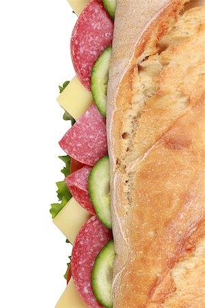 simsearch:700-01716556,k - Top view of a sub sandwich with salami, cheese, tomatoes, lettuce and cucumber Photographie de stock - Aubaine LD & Abonnement, Code: 400-06759797