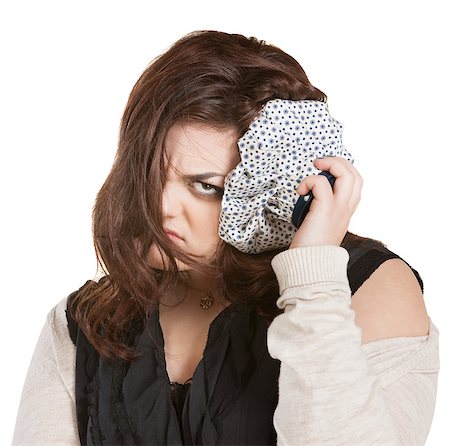 Pouting young lady with ice pack on head Stock Photo - Budget Royalty-Free & Subscription, Code: 400-06759973