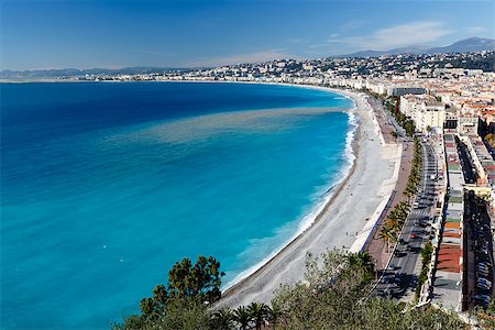 french riviera - Promenade des Anglais and Beautiful Beach in Nice, French Riviera, France Foto de stock - Super Valor sin royalties y Suscripción, Código: 400-06750584