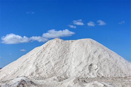 Big pile of freshly mined salt, set against a blue sky Stock Photo - Budget Royalty-Free & Subscription, Code: 400-06751096