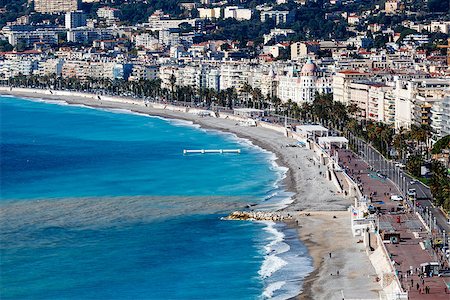 french riviera - Promenade des Anglais and Beautiful Beach in Nice, French Riviera, France Foto de stock - Super Valor sin royalties y Suscripción, Código: 400-06751610