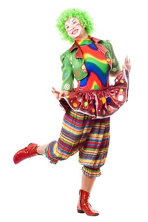 Happy posing female clown. Isolated on white Stock Photo - Budget Royalty-Free & Subscription, Code: 400-06764397