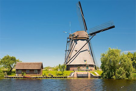 simsearch:400-05319608,k - A windmill at Kinderdijk in May. GPS information is in the file Stock Photo - Budget Royalty-Free & Subscription, Code: 400-06766812