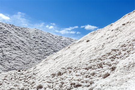 Big pile of freshly mined salt, set against a blue sky Stock Photo - Budget Royalty-Free & Subscription, Code: 400-06766964