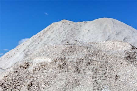 Big pile of freshly mined salt, set against a blue sky Stock Photo - Budget Royalty-Free & Subscription, Code: 400-06766961