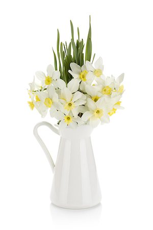 Bouquet of white daffodils in jug. Isolated on white background Stock Photo - Budget Royalty-Free & Subscription, Code: 400-06769881