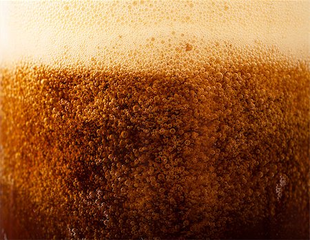 Closeup view of dark beer pouring into the glass Stock Photo - Budget Royalty-Free & Subscription, Code: 400-06760685