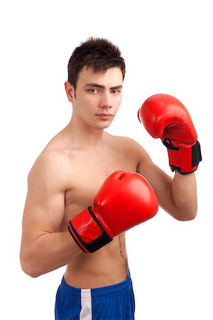 Portrait of young boxer over white background Foto de stock - Super Valor sin royalties y Suscripción, Código: 400-06761194