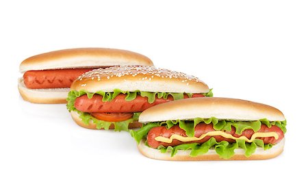 simsearch:400-04587885,k - Three hot dogs with various ingredients. Isolated on white background Stock Photo - Budget Royalty-Free & Subscription, Code: 400-06761719