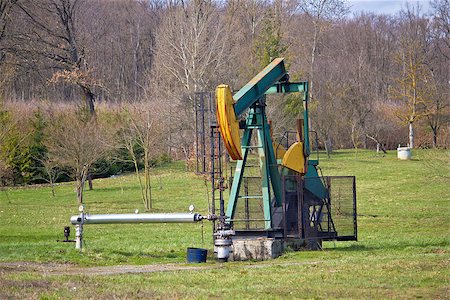 simsearch:400-04317986,k - Oil pump in green nature, oilfield in Croatia Stock Photo - Budget Royalty-Free & Subscription, Code: 400-06761793