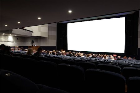 setup - Cinema auditorium with people in chairs watching movie. Ready for adding your own picture. Diagonal perspective view. Stock Photo - Budget Royalty-Free & Subscription, Code: 400-06771119