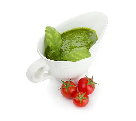 simsearch:400-06796273,k - Pesto sauce and cherry tomatoes. Isolated on white background Stock Photo - Budget Royalty-Free & Subscription, Code: 400-06772172