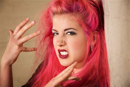 simsearch:400-04831298,k - Emotional young Caucasian punk woman gesturing with her hands Stock Photo - Budget Royalty-Free & Subscription, Code: 400-06788323