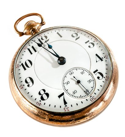 pocket watch - Antique golden pocket watch showing a few minutes to midnight isolated on white background. Concept of time,the past or deadline. Stock Photo - Budget Royalty-Free & Subscription, Code: 400-06788574