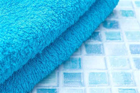 pool floor texture color - Blue Bath Towels on Blue Bathroom Tiles Stock Photo - Budget Royalty-Free & Subscription, Code: 400-06789860