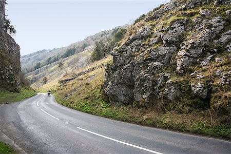 motorbike driving up the country road through cheddar gorge in somerset england Stock Photo - Budget Royalty-Free & Subscription, Code: 400-06795361