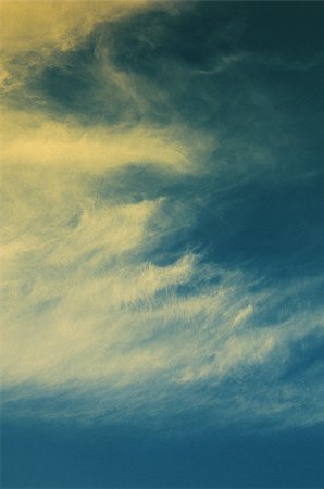 clouds on a textured vintage paper background, with grunge stains Foto de stock - Super Valor sin royalties y Suscripción, Código: 400-06795400