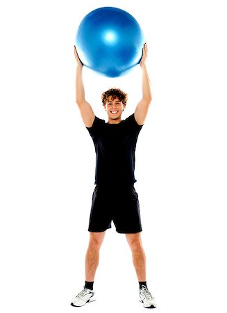 simsearch:400-06482604,k - Man showing big ball over his head. Facing camera Stock Photo - Budget Royalty-Free & Subscription, Code: 400-06795512