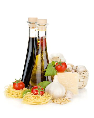 simsearch:400-06796273,k - Pasta, tomatoes, basil, olive oil, vinegar, garlic and parmesan cheese. Isolated on white background Stock Photo - Budget Royalty-Free & Subscription, Code: 400-06796108