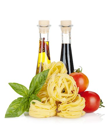 simsearch:400-06796273,k - Italian colors food. Basil, pasta, tomatoes, olive oil and vinegar. Isolated on white background Stock Photo - Budget Royalty-Free & Subscription, Code: 400-06796112