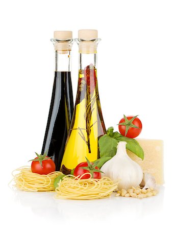 simsearch:400-06796273,k - Pasta, tomatoes, basil, olive oil, vinegar, garlic and parmesan cheese. Isolated on white background Stock Photo - Budget Royalty-Free & Subscription, Code: 400-06796266