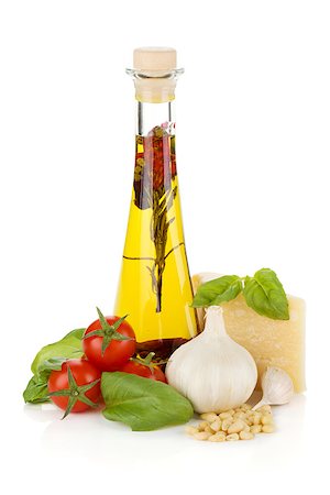 simsearch:400-06796273,k - Olive oil, cherry tomatoes, basil, garlic and parmesan. Isolated on white background Stock Photo - Budget Royalty-Free & Subscription, Code: 400-06796267