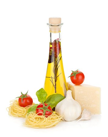 simsearch:400-06796273,k - Pasta, tomatoes, basil, olive oil and parmesan cheese. Isolated on white background Stock Photo - Budget Royalty-Free & Subscription, Code: 400-06796263