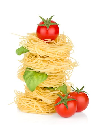 simsearch:400-06796273,k - Italian pasta, tomatoes and basil. Isolated on white background Stock Photo - Budget Royalty-Free & Subscription, Code: 400-06796271